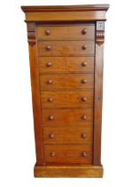 AN EARLY 19TH CENTURY MAHOGANY WELLINGTON CHEST of eight drawers, 131cm high, 58cm wide, 42cm deep.