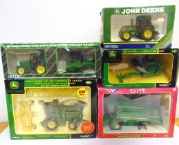 A 1/32 SCALE MODEL TRACTOR & FARM IMPLEMENT COLLECTION comprising a Britains No.40423, John Deere