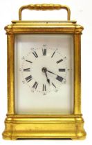 A FRENCH GILT-BRASS CARRIAGE CLOCK, HENRI JACOT, PARIS late 19th century, the white enamel dial with