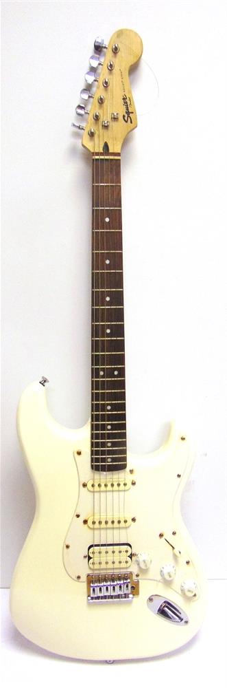 A SQUIER BY FENDER BULLET STRATOCASTER ELECTRIC GUITAR crafted in Indonesia, white, serial no.s/