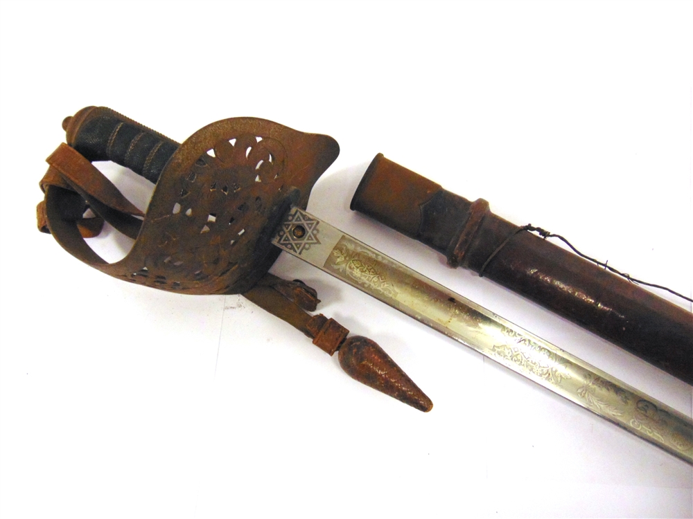 A BRITISH 1897 PATTERN OFFICER'S SWORD by Robert Mole, the 82cm straight polished blade etched