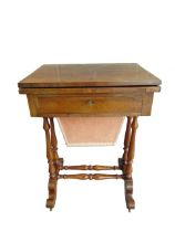 A 19TH CENTURY ROSEWOOD COMBINATION GAMES & WORK TABLE the fold-over top revealing chess, backgammon