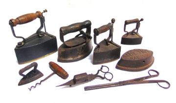 ASSORTED COLLECTABLES comprising flat irons, including two with brass faces; a straight-pull