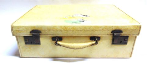 A VELLUM SUITCASE 17cm high, 51cm wide, 35cm deep (excluding carrying handle).