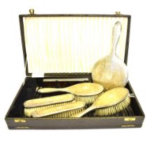 SILVER DRESSING TABLE SET Comprising hand held mirror, four brushes (hair and clothes) one comb in
