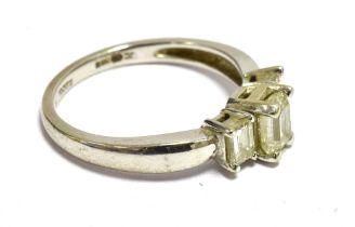 ILIANA 18K DIAMOND THREE STONE RING (WHITE GOLD) Three step cut diamonds central 4 x 3mm approx. Two