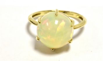 TJC 14K YELLOW GOLD OPAL COCKTAIL RING The round light opal measuring approx 1cm in diameter and 1cm