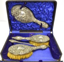 CASED SILVER DRESSING TABLE SET 1x Mirror, 2 x brushes, together with a button hook.Sold as seen.