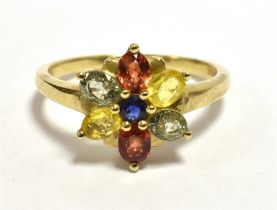 9ct GOLD SAPPHIRE SET FLOWER HEAD RING The flower set with orange, yellow and blue sapphires,