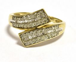 TJC 9CT GOLD DIAMOND CROSSOVER RING Ring size O 3/4, Weight 2.7g Condition Report : Mixed cut