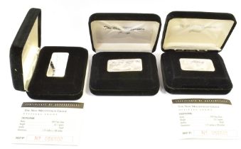 THREE BOXED SILVER PROOF INGOTS The New Millennium group official ingot 999 fine silver, 31.1g each.