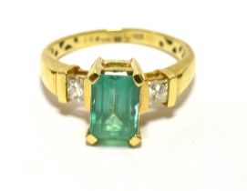 ILIANA 18k EMERALD AND DIAMOND COCKTAIL RING The step cut emerald measuring 9 x 6mm approx-