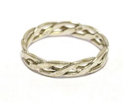 CELTIC BAND RING In a white metal stamped 750, ring size M1/2, weight 2.7g