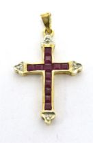 RUBY SET CROSS PENDANT Calibre cut rubies set in yellow metal with millgrain white metal detail -