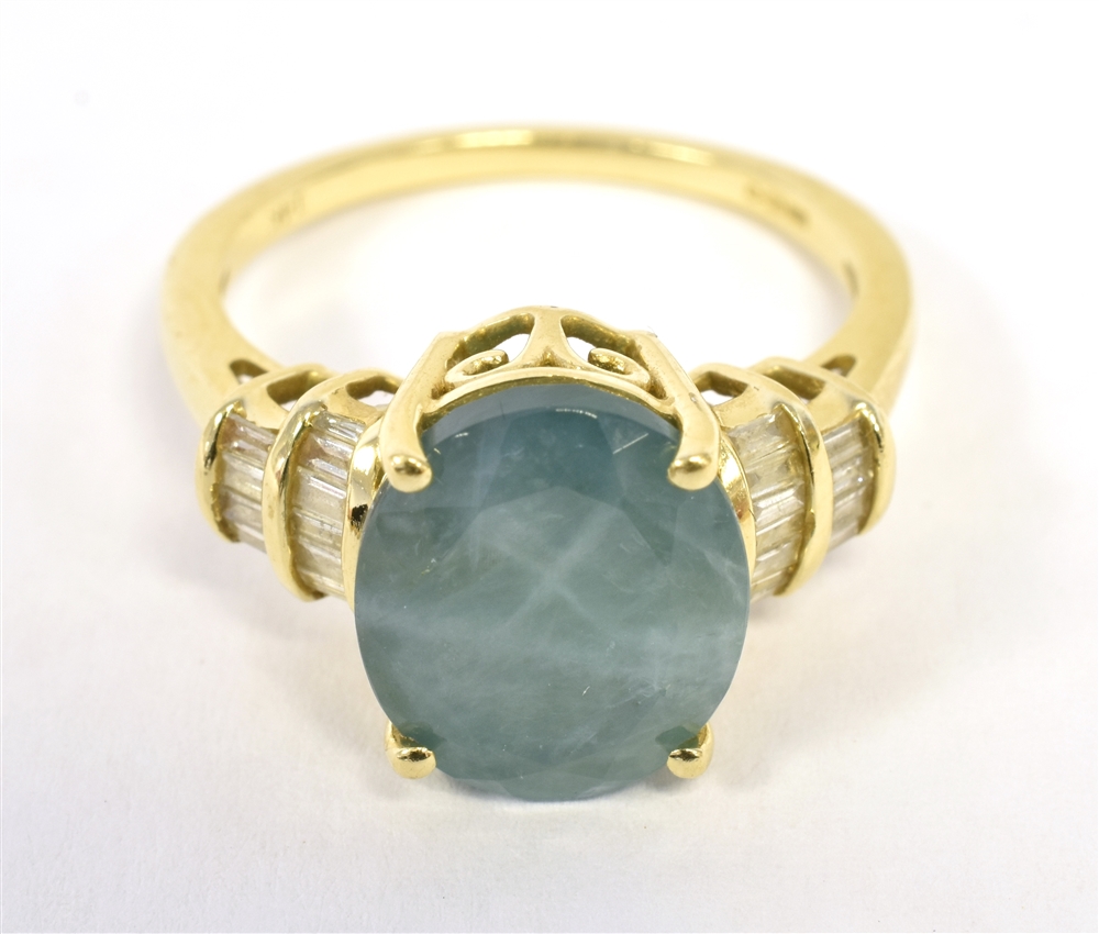 IKK GOLD PARAIBA AND DIAMOND COCKTAIL RING the faceted oval blue (turquoise) paraiba measuring