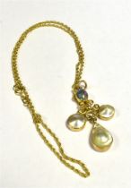 OPAL AND SHELL PEARL PENDANT WITH CHAIN The unmarked yellow metal pendant set with a fancy scroll