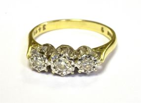 VINTAGE 18ct GOLD DIAMOND THREE STONE DRESS RING The three small old cut diamonds illusion set in