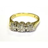 VINTAGE 18ct GOLD DIAMOND THREE STONE DRESS RING The three small old cut diamonds illusion set in