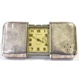 VINTAGE MOVADO ERMETO POCKET WATCH AND STAND Metal case and stand. Stand marked suisse patent Movado