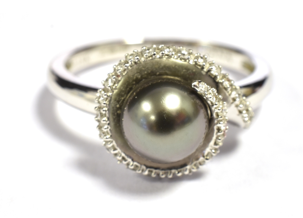 ILIANA 18K WHITE GOLD, BLACK PEARL DRESS RING The pearl measuring 7mm in diameter with a wrap over