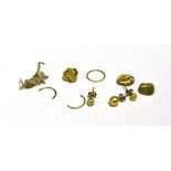 A COLLECTION OF ODDMENTS To include yellow metal stud earrings and two gold dental capped fillings.