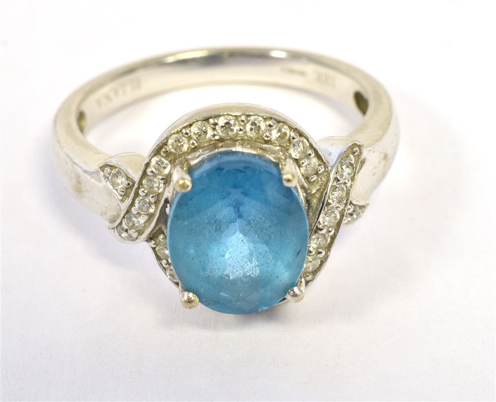 ILIANA 18K WHITE GOLD CLUSTER RING the cluster comprising an oval turquoise glass stone in a diamond