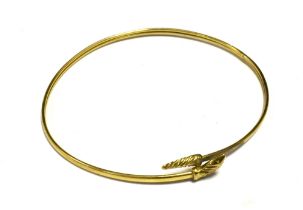 YELLOW METAL SNAKE HOOP BANGLE The thin bangle with expandable opening, un-marked, weight 2g