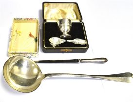 ASSORTED COLLECTABLES Cased silver egg cup and spoon. Large silver plated soup ladle (with crest and