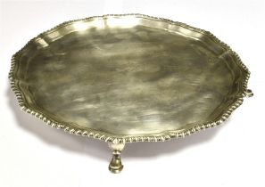 HARRODS FOOTED SILVER SALVER The salver with scalloped border and beaded rim on four hoof feet