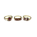 THREE 9CT GOLD GEM SET DRESS RINGS ( Red,pink and purple) Ring sizes N, S, U. Total weight 7g