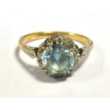 VINTAGE BLUE ZIRCON AND DIAMOND HALO RING Ring stamped 18CT Plat Ring size O 1/2, Weight 4g