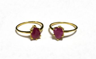 TWO HOT PINK STONE SET RINGS The rings both set with pear shaped stones, shade varied, both