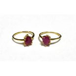 TWO HOT PINK STONE SET RINGS The rings both set with pear shaped stones, shade varied, both