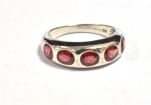 9CT WHITE GOLD RUBY FIVE STONE DRESS RING Ring size O, weight 4g Condition Report : Rublies may be