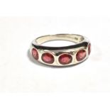 9CT WHITE GOLD RUBY FIVE STONE DRESS RING Ring size O, weight 4g Condition Report : Rublies may be