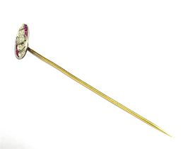 OLD CUT DIAMOND AND RUBY HEADED STICK PIN The head set with five diamonds, the central one measuring