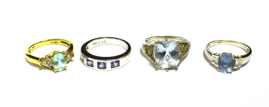 FOUR 18K GOLD DRESS RINGS Gem and stone set two Iliana, three white gold and one white gold ring