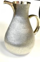 LARGE SILVER JUG Textured body, hallmarked London 1972, maker CNL. Height 23cm, weight 980g approx