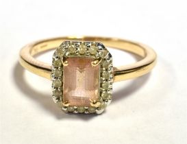 9CT GOLD MORGANITE AND DIAMOND COCKTAIL RING The step cut Morganite in a diamond set hexagonal