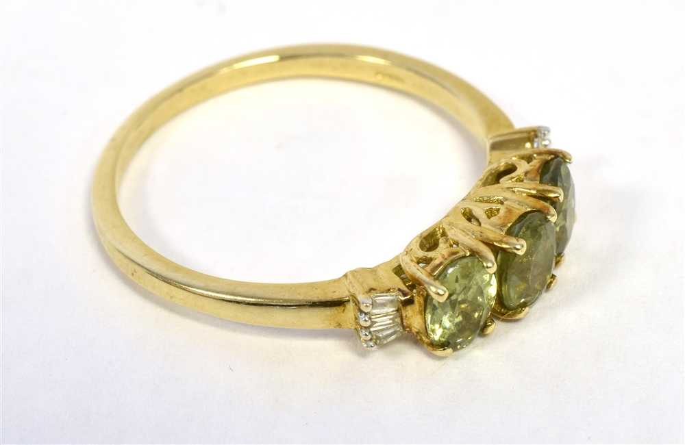 9K GREEN GARNET THREE STONE DRESS RNG ring size P1/2, weight 2g approx - Image 2 of 3