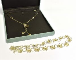 DESIGNER SILVER NECKLACES & BRACELETS To include; a 40cm long, daisy chain necklace with gilded