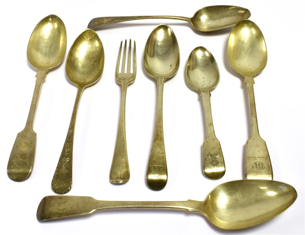 EARLY SILVER FLATWARE To include fiddle shaped and Hanoverian spoons, hallmarked Exeter 1800, 1804