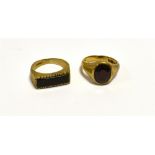 9CT GOLD GYSPY SET RINGS One oval pyrope garnet, approx 10.0 x 5.0mm, hallmarked 375 London 1968.