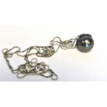TAHITIAN BLACK PEARL & DIAMOND PENDANT 7.9mm black pearl of very good quality on an 18ct white gold,