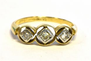 EDWARDIAN 18CT GOLD & DIAMOND RING Three platinum grain set cheniers in 18ct gold, open work frames,