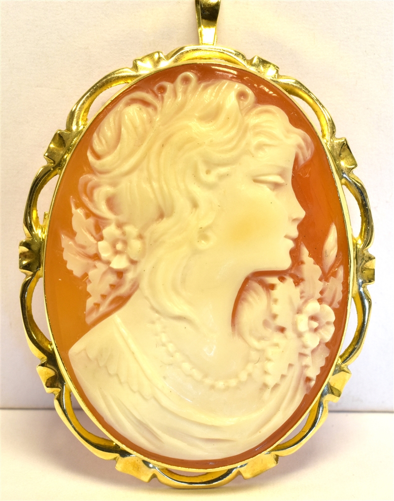 18CT GOLD SHELL CAMEO BROOCH 4.5cm long x 3.2cm wide, portrait of a classical woman with flowers