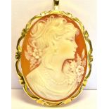 18CT GOLD SHELL CAMEO BROOCH 4.5cm long x 3.2cm wide, portrait of a classical woman with flowers