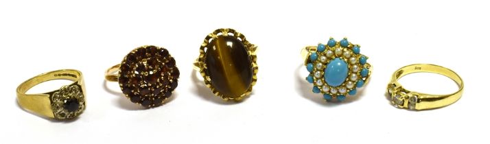 VARIOUS 9CT GOLD & GEM SET RINGS To include in 9ct gold; an oval tiger's eye cabochon, garnet set