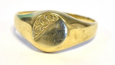 9CT GOLD SIGNET RING Oval shaped partially engraved signet ring, size V. Hallmarked 375 London.