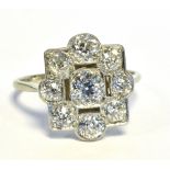 ART DECO & ESTATE CUT DIAMOND RING Set in platinum, pierced geometric mount, mille grain set with